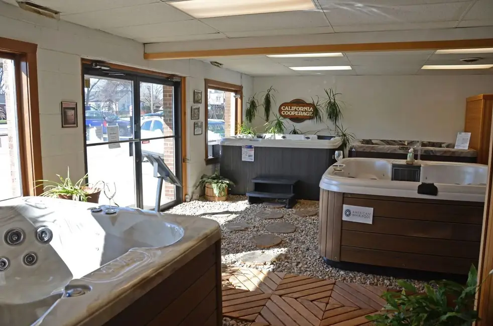 Showroom by day with tubs and plants in window light